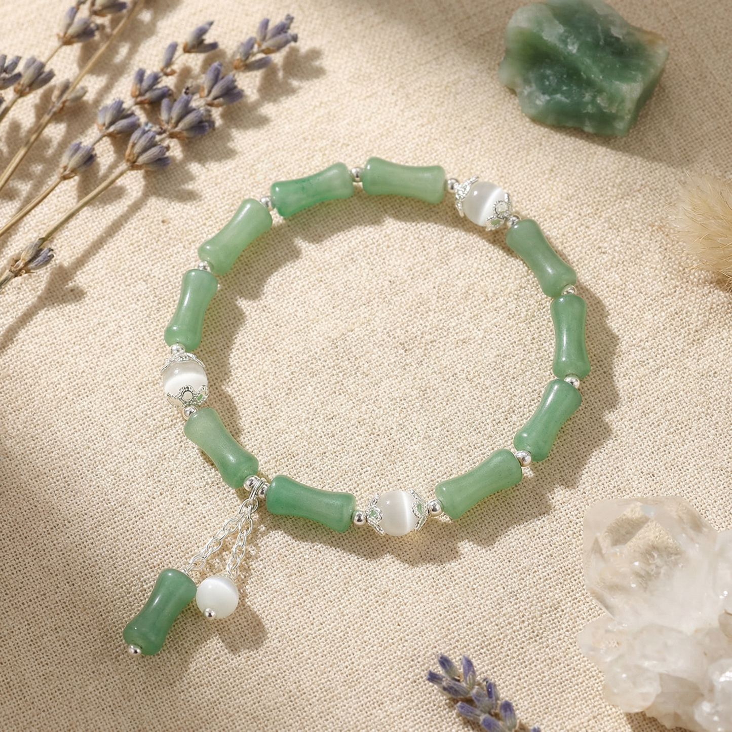 The Bamboo Vitality Bracelet, featuring red aventurine and silver accents, brings dynamic, powerful, and flowing energy.
