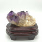 Amethyst cluster with wooden tray
