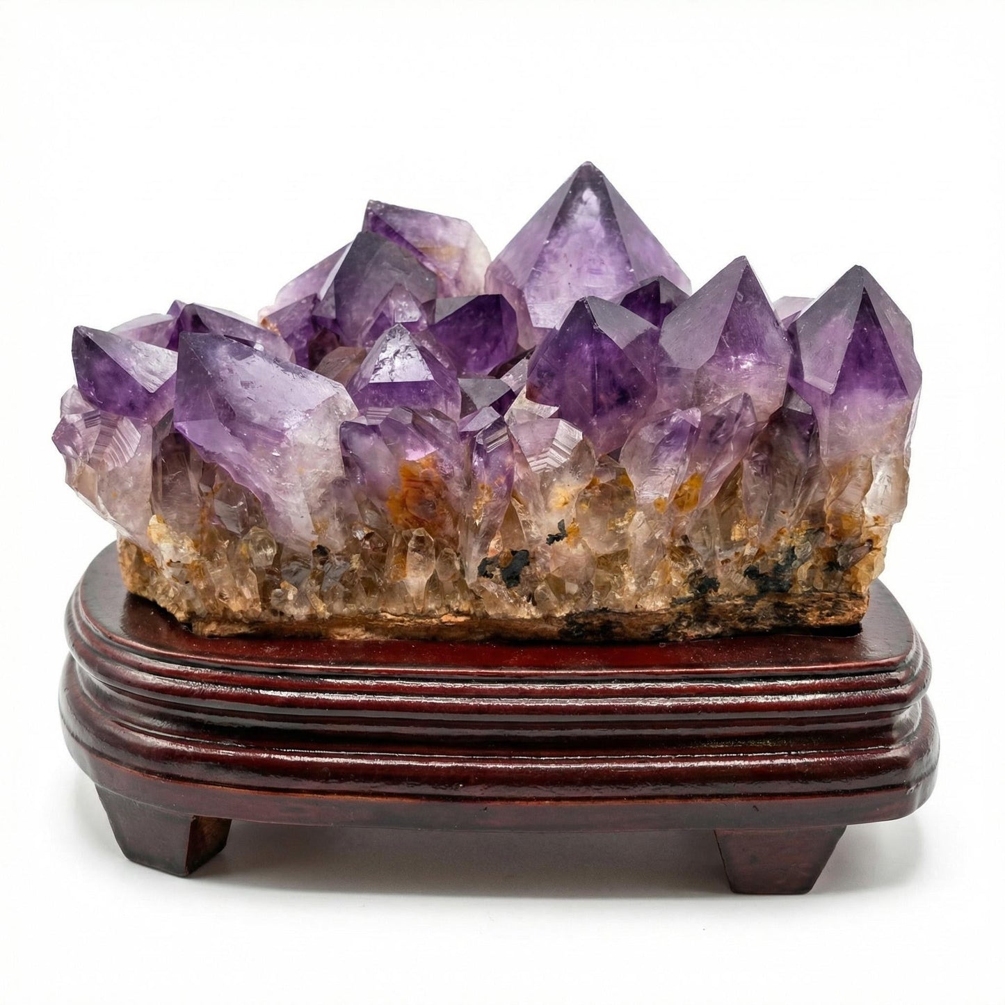 Amethyst cluster with wooden tray