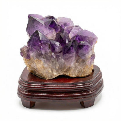 Amethyst cluster with wooden tray