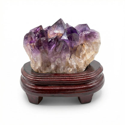 Amethyst cluster with wooden tray