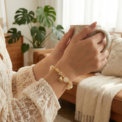 Golden Spirit Bracelet – White jade, white crystal, and amber crystal bring power, wisdom, and radiance.