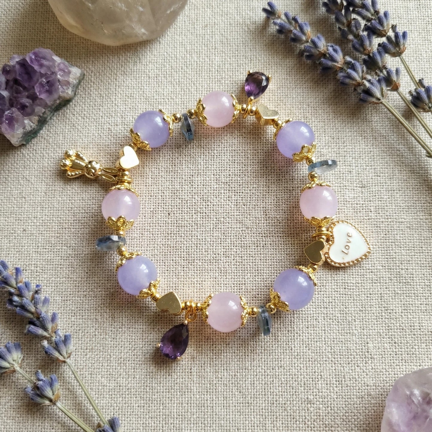 Whispers of Love Bracelet – Lavender jade, rose quartz, and amethyst bring love, elegance, and angelic protection.