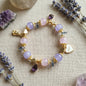 Whispers of Love Bracelet – Lavender jade, rose quartz, and amethyst bring love, elegance, and angelic protection.