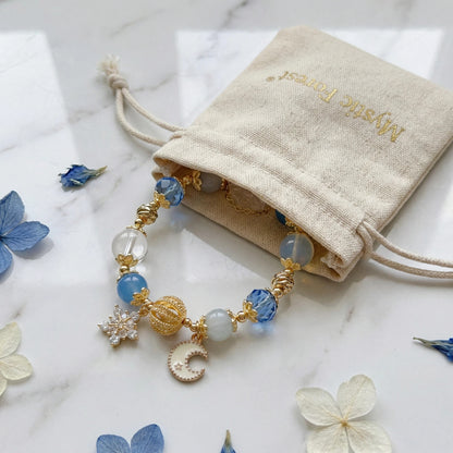 Moonlight Frost Bracelet – Blue crystal, opal, and clear quartz bring tranquility, magic, and winter elegance.