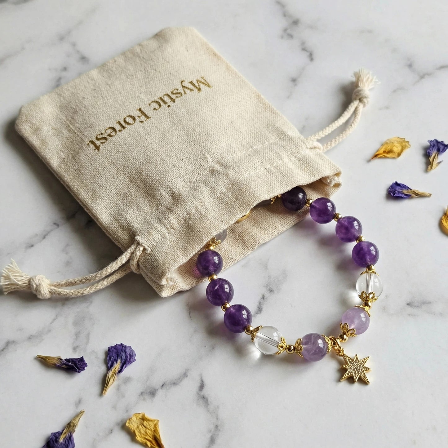 Polaris Wisdom Bracelet - Amethyst and Clear Quartz enhance intuition and clarity.