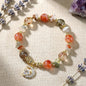 Earthfire Vitality Bracelet - A blend of rutilated quartz for grounding and creativity.