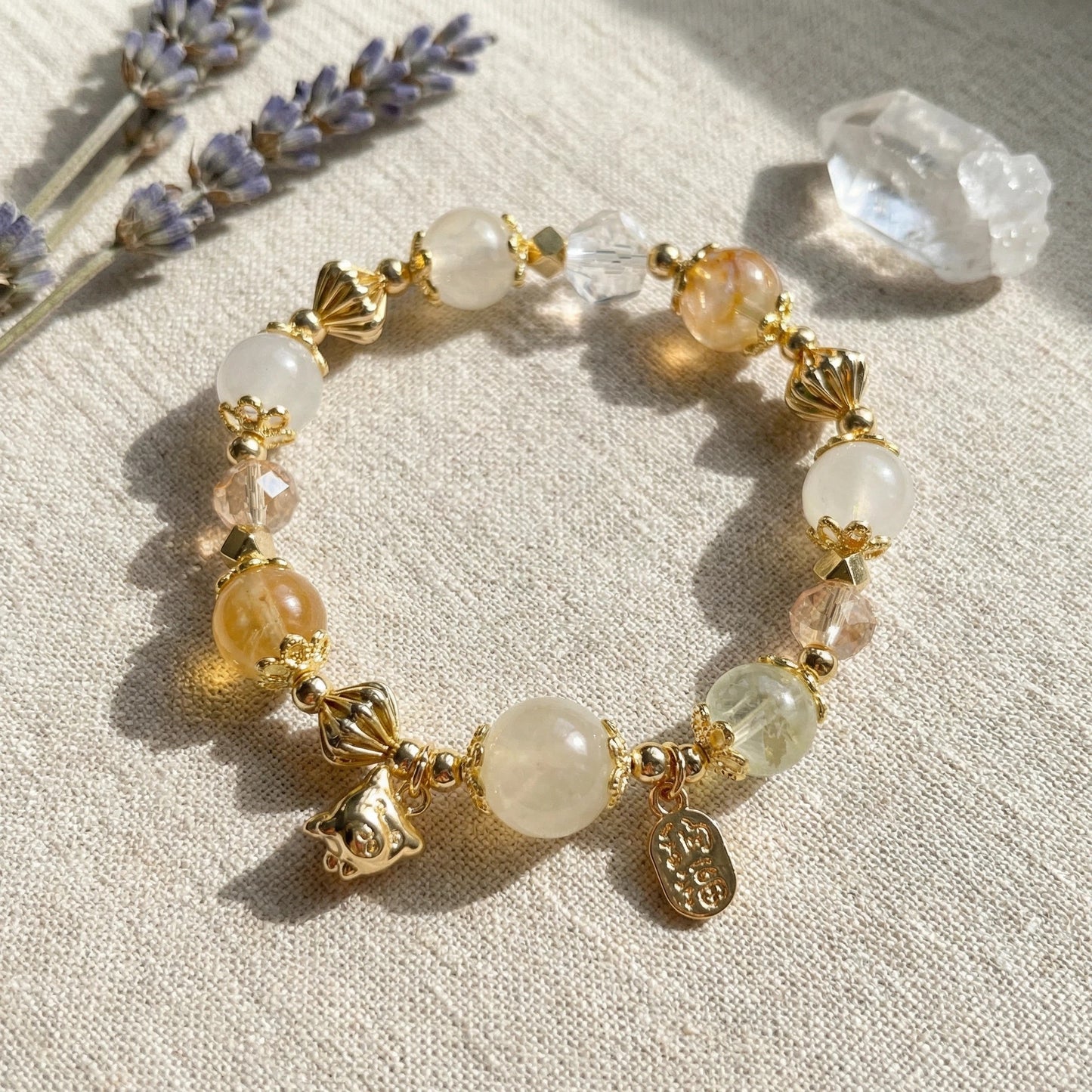 Golden Spirit Bracelet – White jade, white crystal, and amber crystal bring power, wisdom, and radiance.
