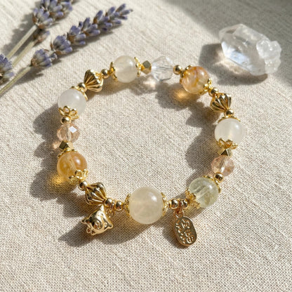Golden Spirit Bracelet – White jade, white crystal, and amber crystal bring power, wisdom, and radiance.