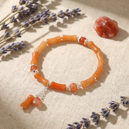 The Bamboo Vitality Bracelet, featuring red aventurine and silver accents, brings dynamic, powerful, and flowing energy.